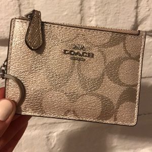 Coach mini wallet light gold